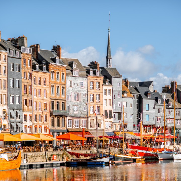 Waterfront with beautiful old buildings in Honfleur, famous french town in Normandy