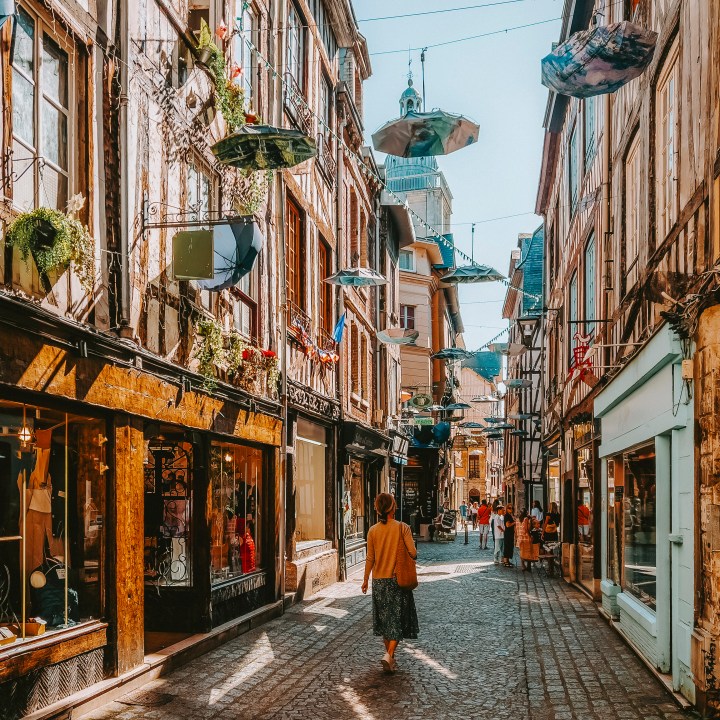 Woman sightseeing Rouen old town district Normandy France
